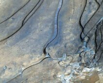 Foto-Negativ einer gefrorenen Pfütze